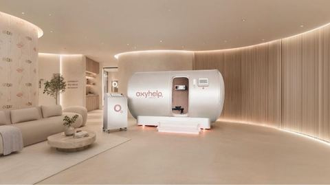 OxyLife-cabine in een warm verlichte spa-ontvangstruimte